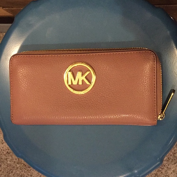 Michael Kors Handbags - Mauve colored Michael Kors wallet.